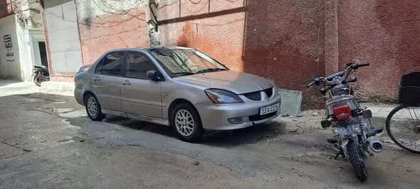 صورة من إعلان: ميتسوبيشي لانسر ٢٠٠٦ (3)