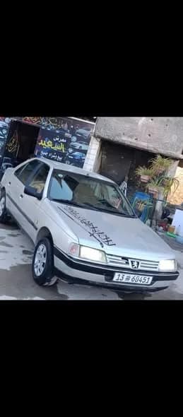 صورة من إعلان: · بيجو 405GLX شد امامي (1)